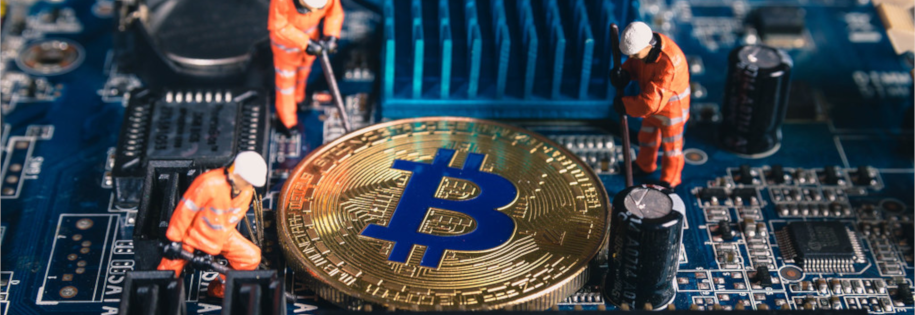 Górnicy wydobywają bitcoiny - minning kryptowalut